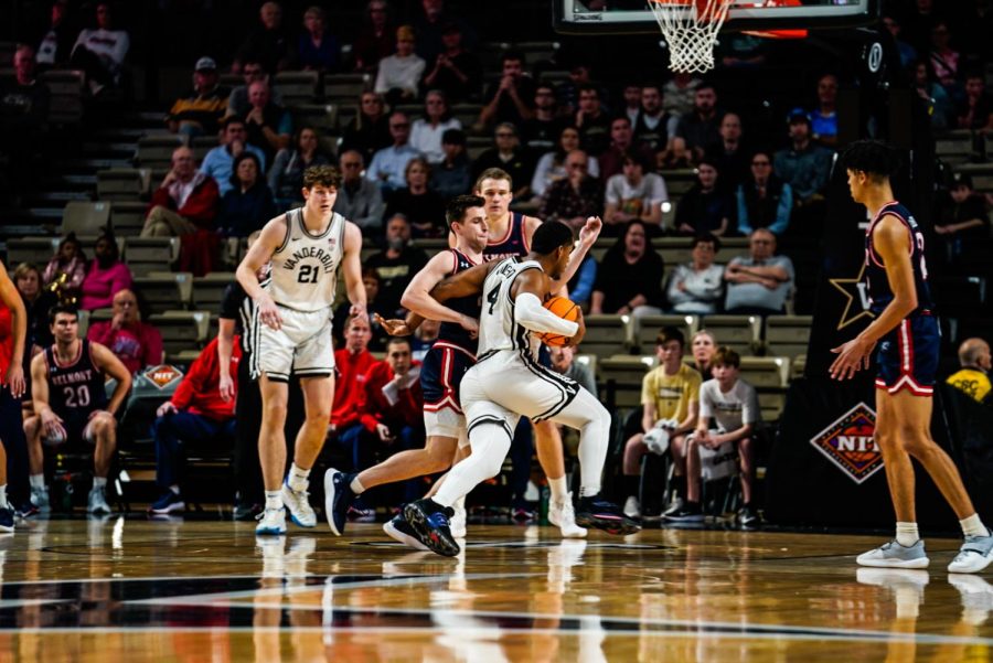 Vanderbilt guard Jordan Wright drives against Belmont in Round 1 of the NIT at Memorial Gymnasium.