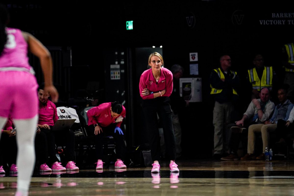 Head coach Shea Ralph looks on her team as a play progresses on Monday Feb. 5, 2024 at Memorial Gymnasium. (Hustler Multimedia/Michael Tung)