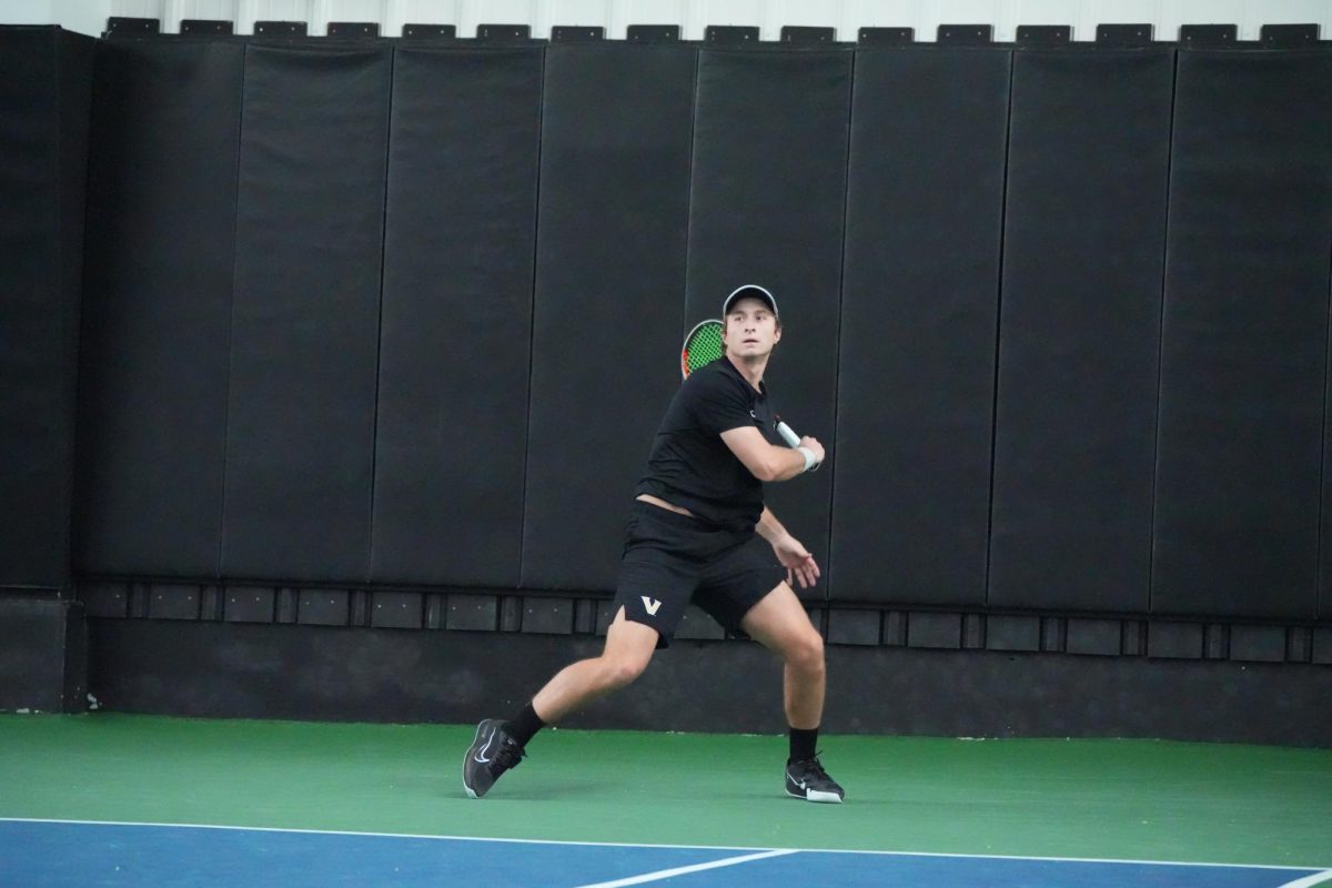 Henry Ruger smacks a forehand, as photographed on Jan. 16, 2025. (Vanderbilt Athletics)