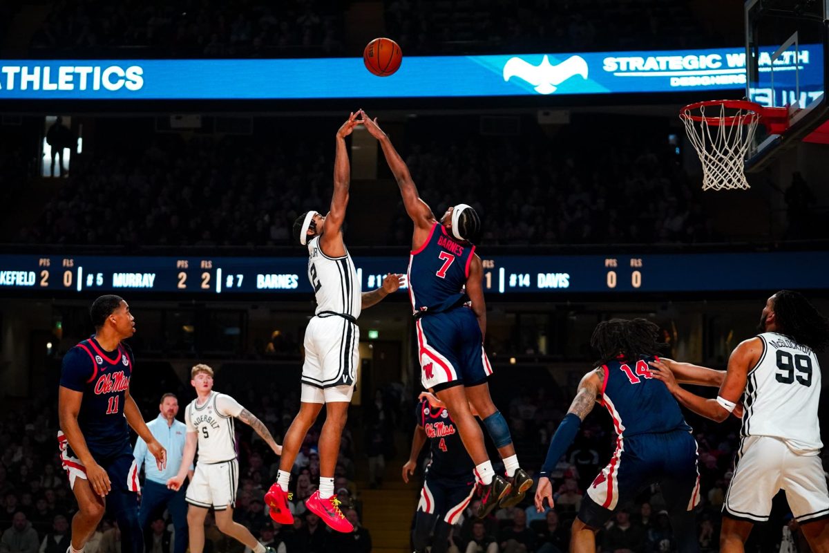 MJ Collins Jr. shoots the ball over defender as photographed on Feb. 24, 2025. (Hustler Multimedia/Harmony Wang)
